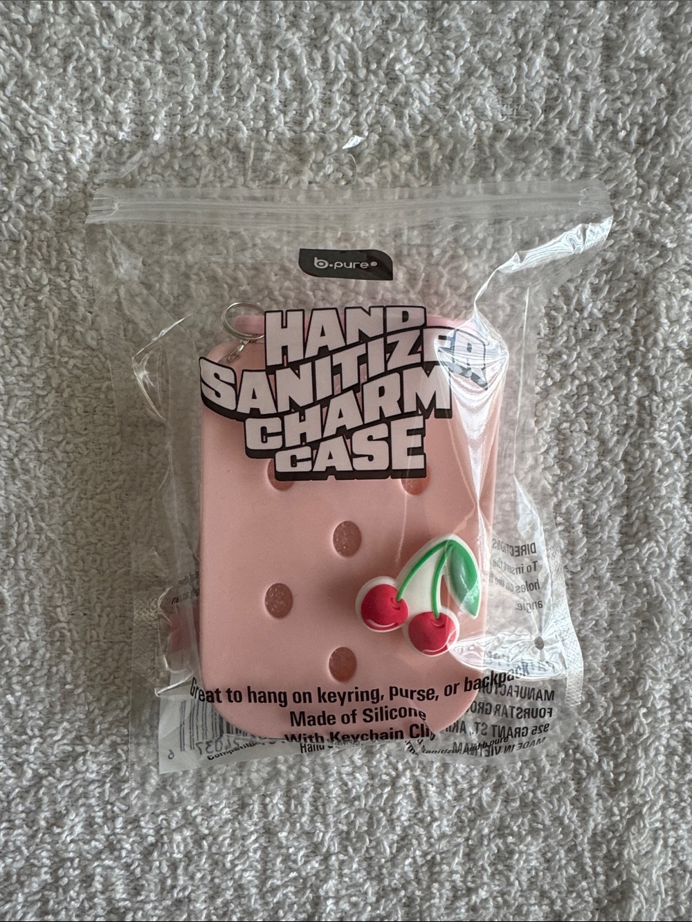 b.pure Pink Hand Sanitizer Charm Case with Cherry Accent
